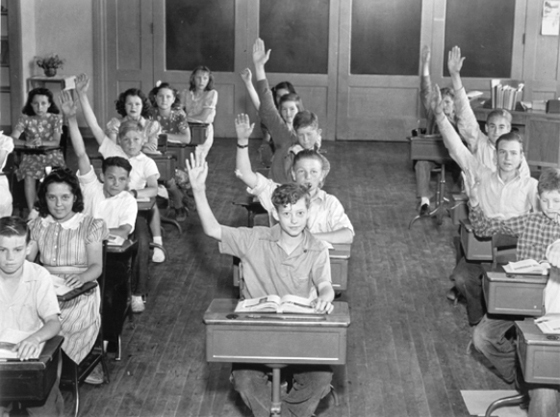 Photograph of a segregated white schoolroom from 1935. Conditions appear to be tidy and good for the children.
